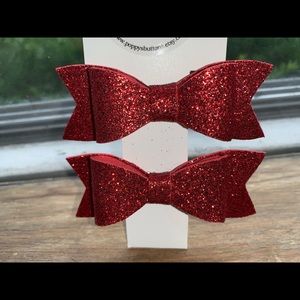 Pair of red hair bows